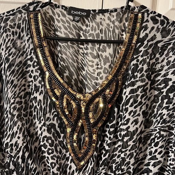 Ladies size Small Bebe top. - Picture 2 of 5